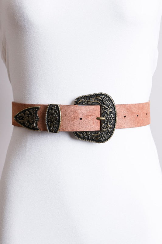 Pink belt with ornate black buckle on a white background