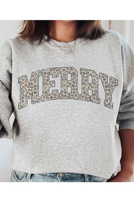 Gray sweatshirt with 'MERRY' in leopard print letters worn by a person.