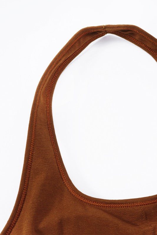 Brown bikini top on a white background