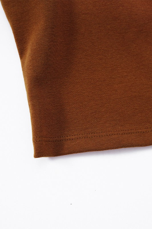 Close-up of a brown fabric edge on a white background