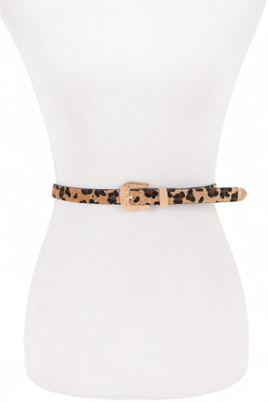 Leopard print belt on a mannequin with a white background