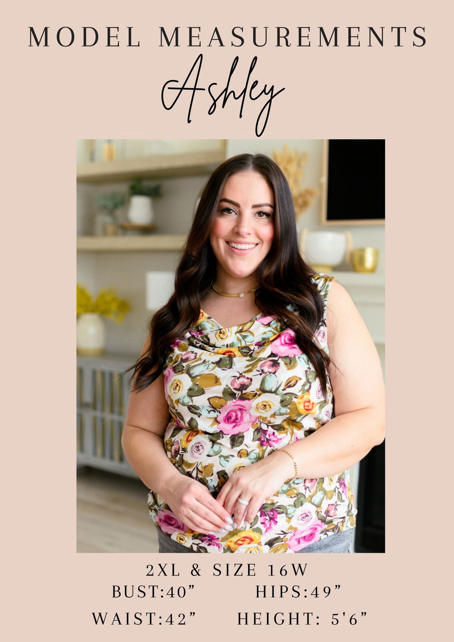 Woman wearing a floral top with model measurements displayed