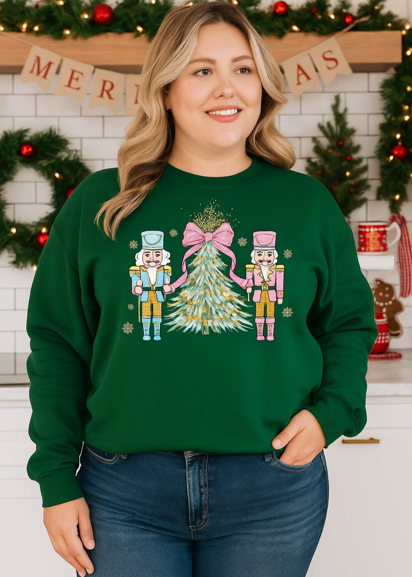 Woman wearing a green Christmas-themed sweatshirt with nutcrackers and a tree in a festive setting.