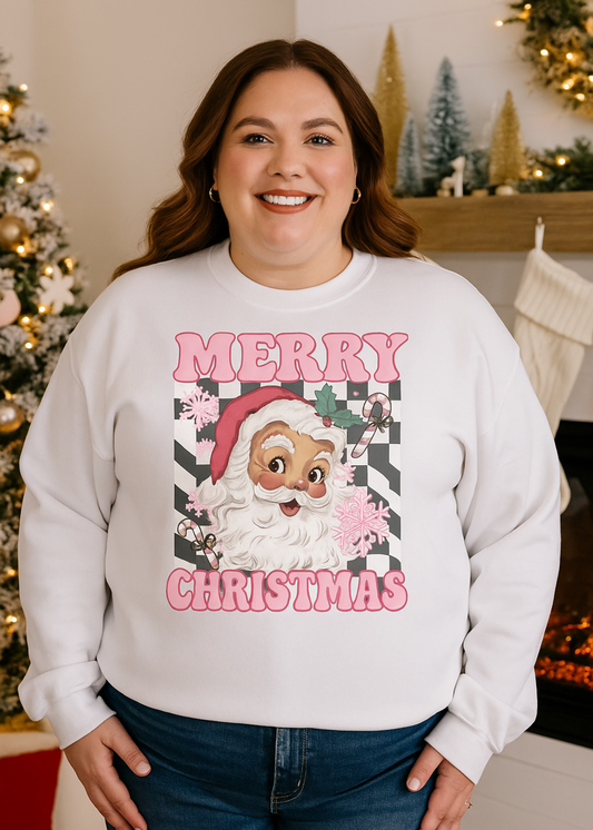 Person wearing a Christmas-themed sweatshirt with a Santa Claus design and 'Merry Christmas' text.