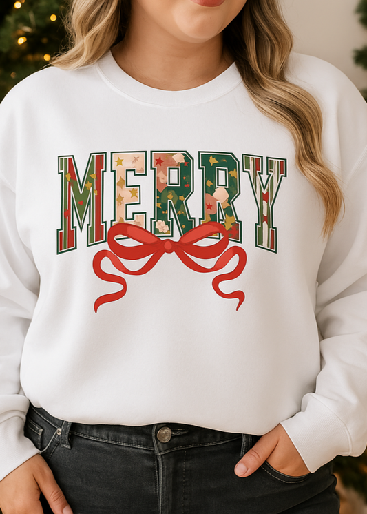 Person wearing a white sweatshirt with 'MERRY' and a red bow graphic in front of Christmas trees.