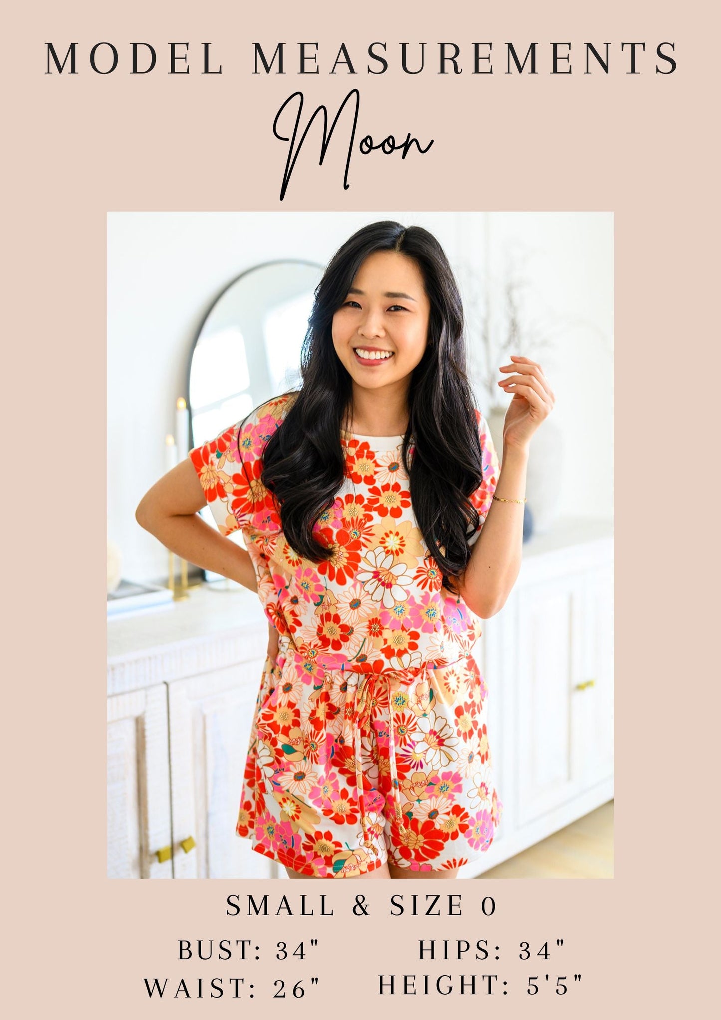 Woman wearing a floral dress with model measurements displayed.