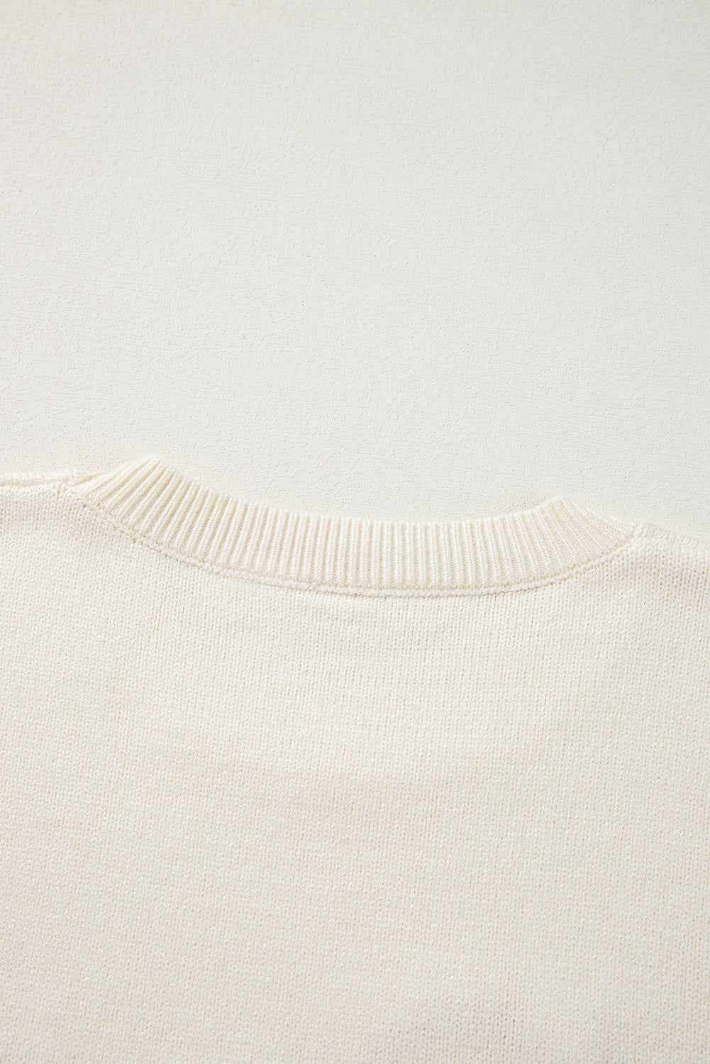 Boo Knitted Pattern Ribbed Edge Drop Shoulder Sweater