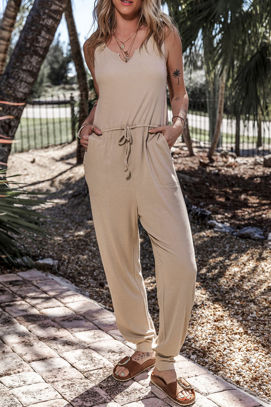 Smoke Gray Jogger Jumpsuit with Drawstring Waist and Pockets.