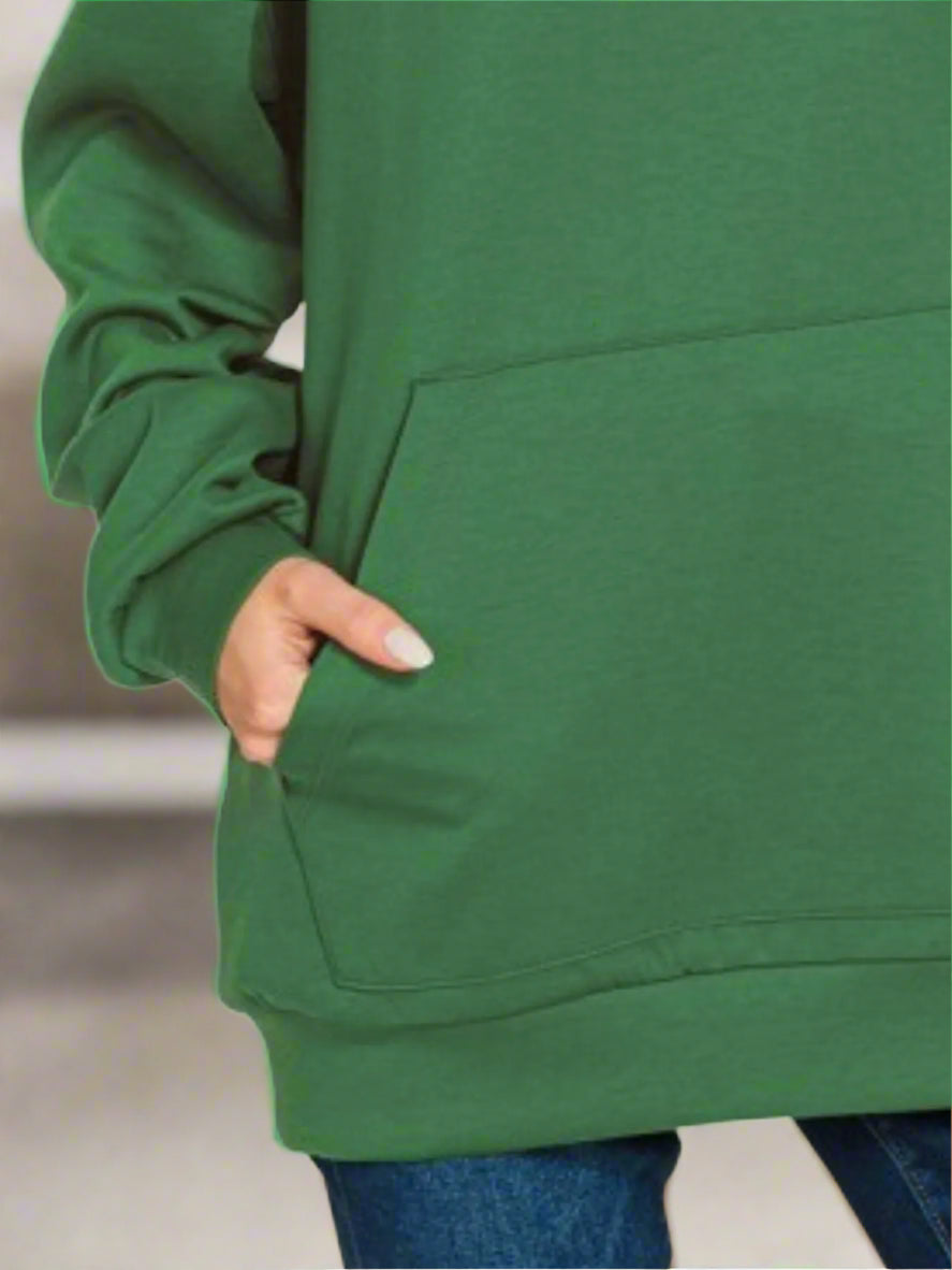 Green hoodie with a pocket on a white background