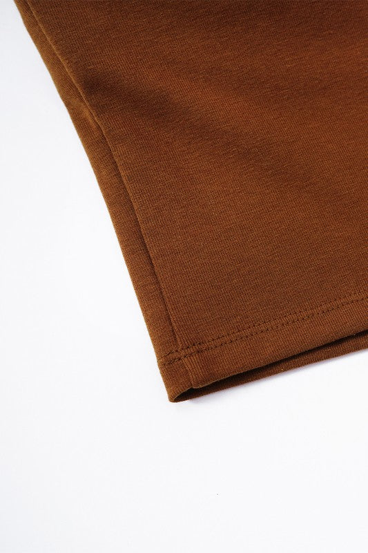 Close-up of brown fabric on a white background