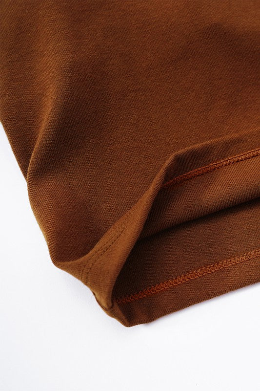 Close-up of brown fabric with a white background