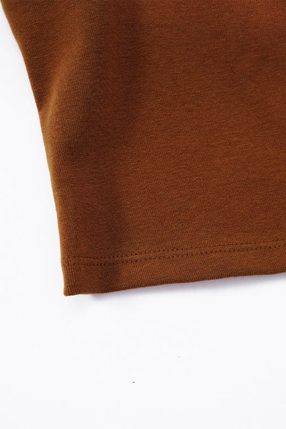 Close-up of a brown fabric edge on a white background