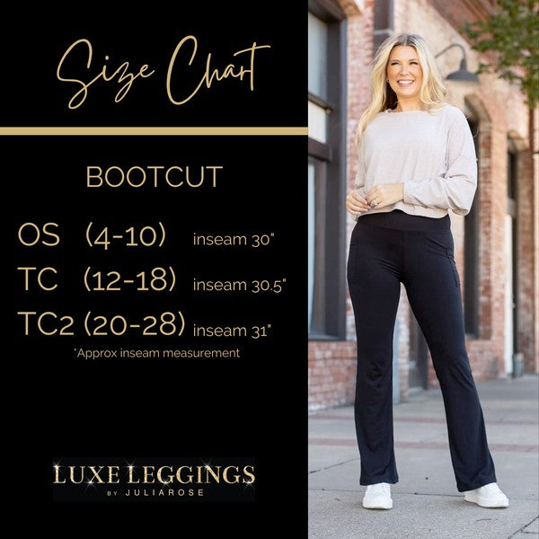 Woman wearing black bootcut leggings with a size chart on the left side.
