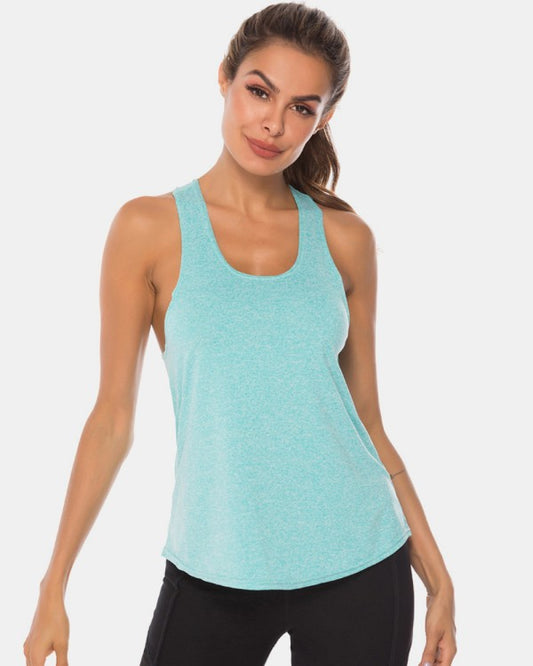 Woman wearing a light blue tank top on a white background