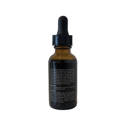 Amber glass dropper bottle with black cap on a white background