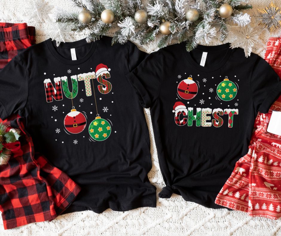Two black Christmas-themed t-shirts with decorative text and ornaments on a festive background.