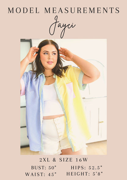 Woman wearing a pastel-colored outfit with text displaying measurements and brand name.