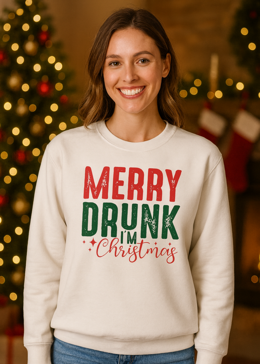 Person wearing a 'Merry Drunk I'm Christmas' sweater with a festive background.