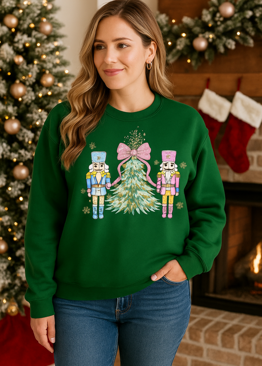 Woman wearing a green sweater with Christmas-themed design in front of a decorated fireplace.