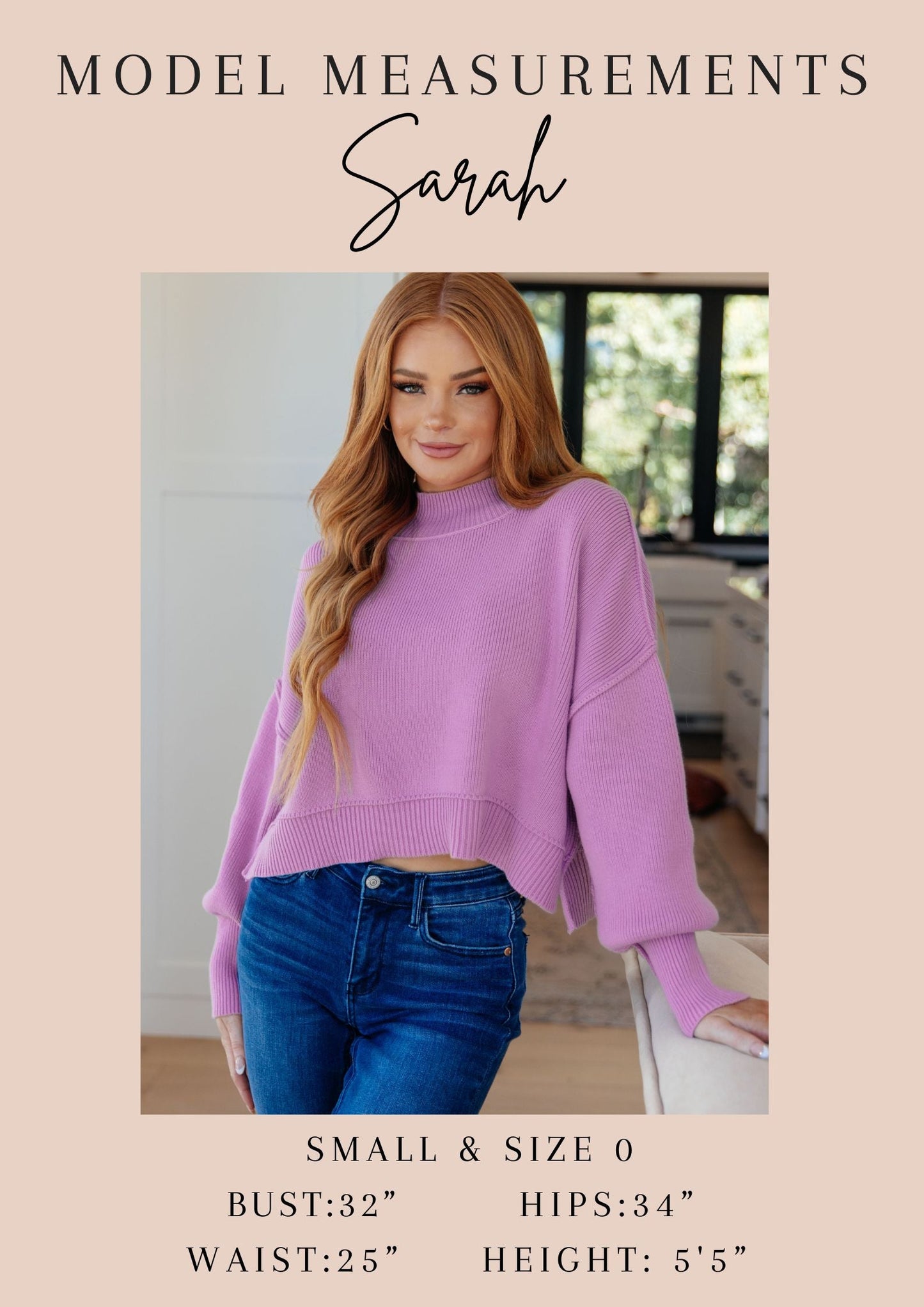 Woman wearing a purple sweater and blue jeans with model measurements displayed.