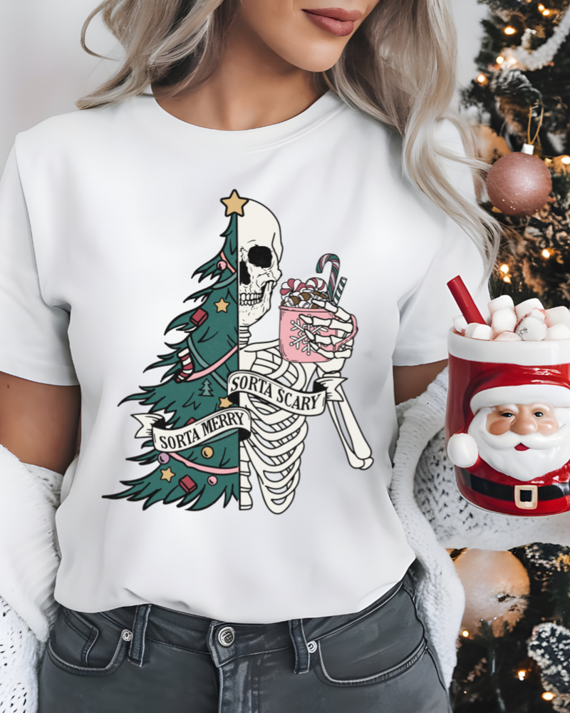 Person wearing a white t-shirt with a Christmas-themed skeleton design, surrounded by holiday decorations.