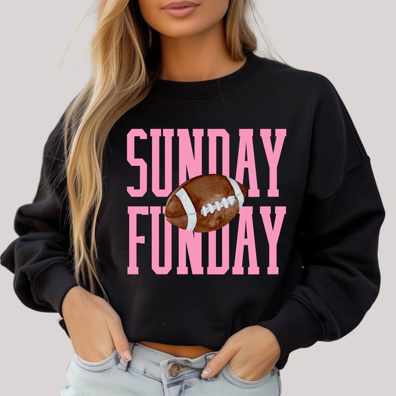Black sweatshirt with 'SUNDAY FUNDA' and football graphic, worn by a person.