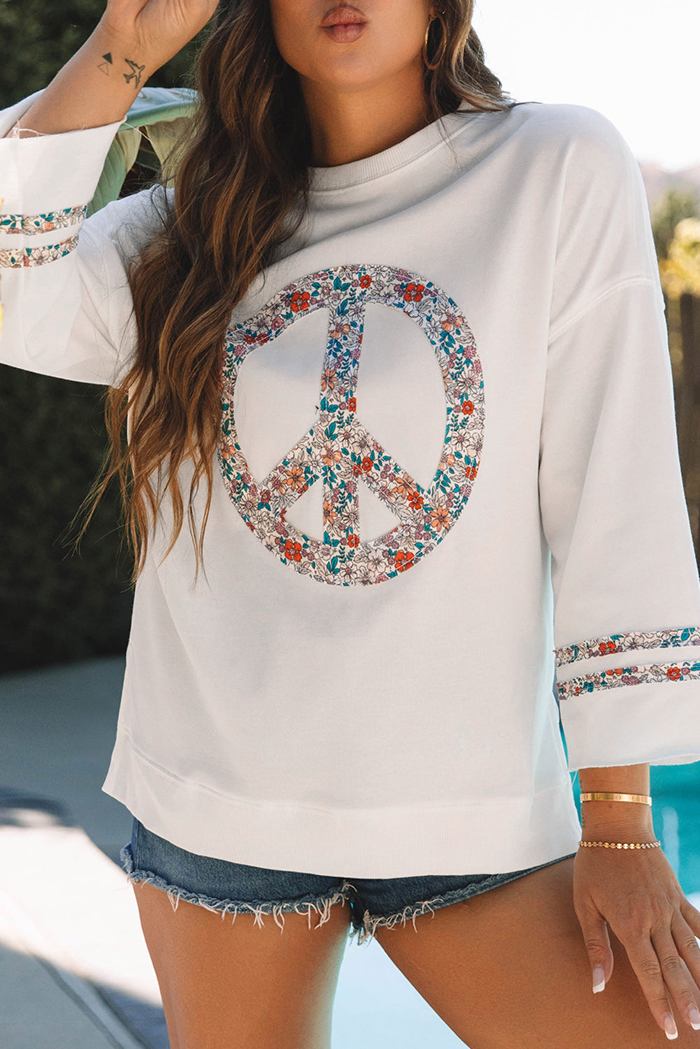 Jet Stream Floral Peace Sign Drop Shoulder Wide Sleeve Casual Top