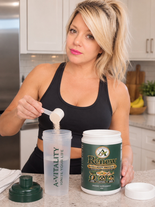 A woman in a black sports tank top stands in a kitchen setting, holding a scoop of powder over a clear shaker bottle. In front of her is a green and white tub labeled 'Renew Collagen Protein' with its lid and a green shaker cap on the counter.
