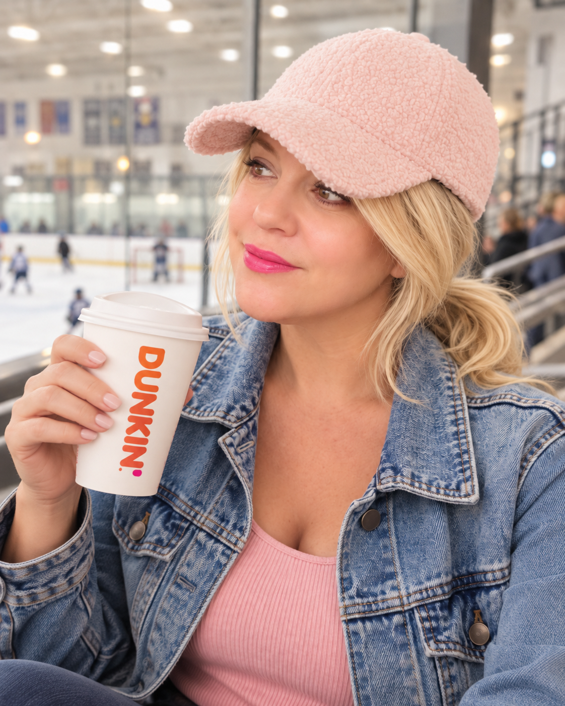 pink sherpa baseball hat sold my arnone boutique, women in a hockey rink drinking coffee